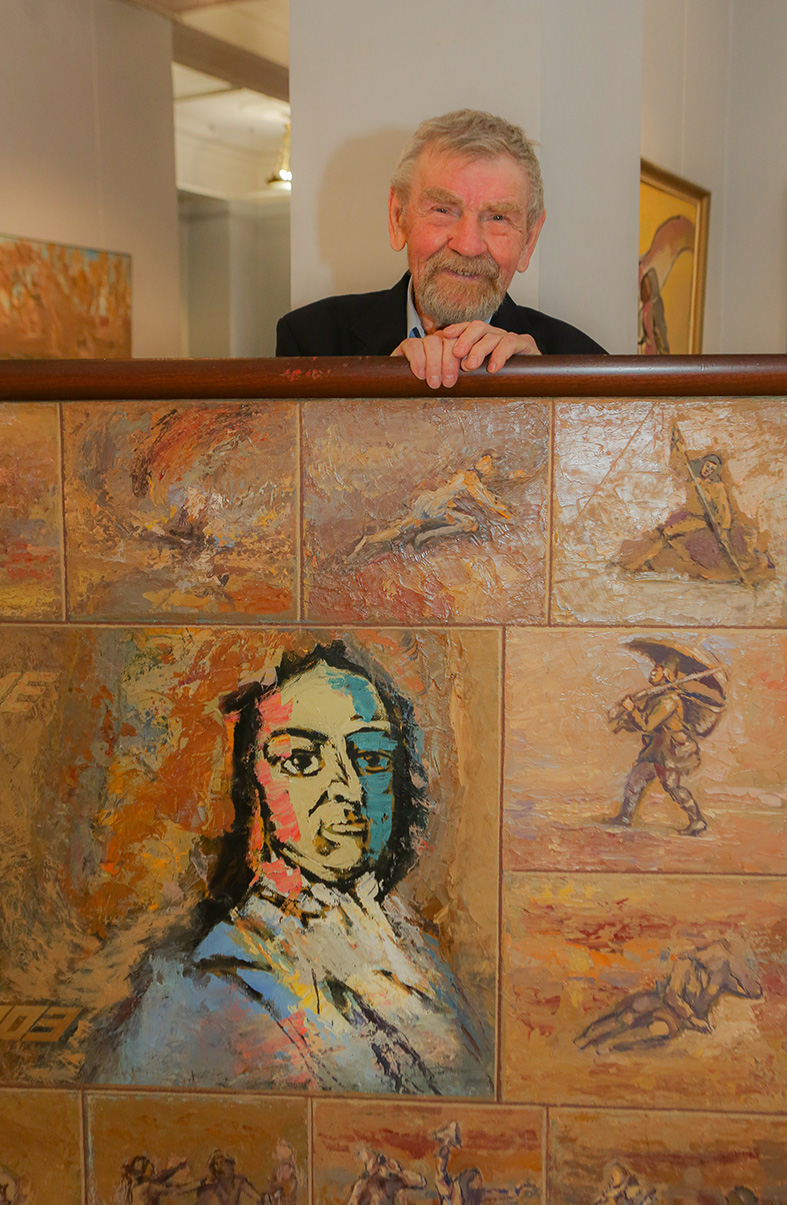 Nikolai Kuzmin at his solo exhibition in December 2024 in Moscow, with his painting, Nikolai Kuzmin at his solo exhibition in December 2024 in Moscow, with his painting,